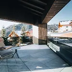 Bacher Living - & *